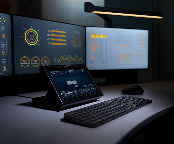 Close-up of WEYTEC smartTOUCH flex, keyboard and multiple screens