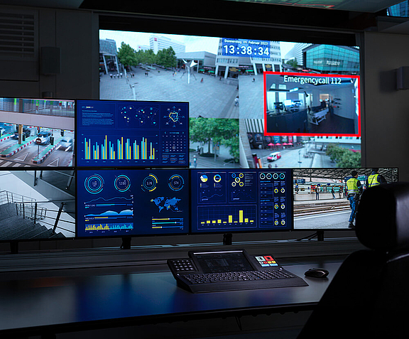 Workplace in the control room with multiple screens and video walls